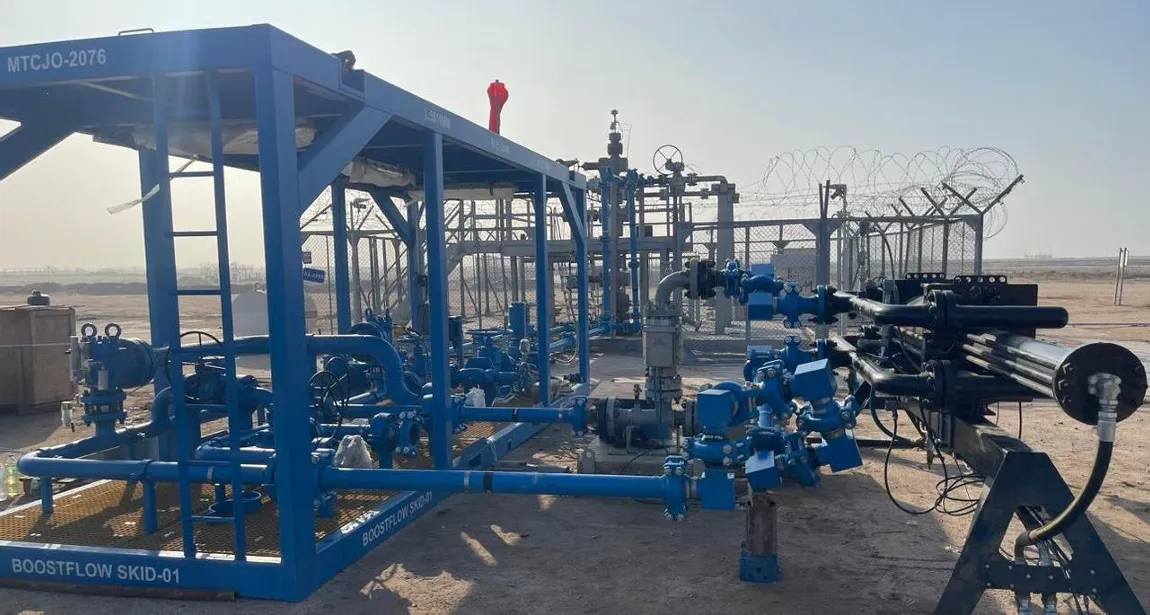 BoostFlow SKID-01 at GC-28 — trailer-mounted multiphase pumping unit at a wellsite